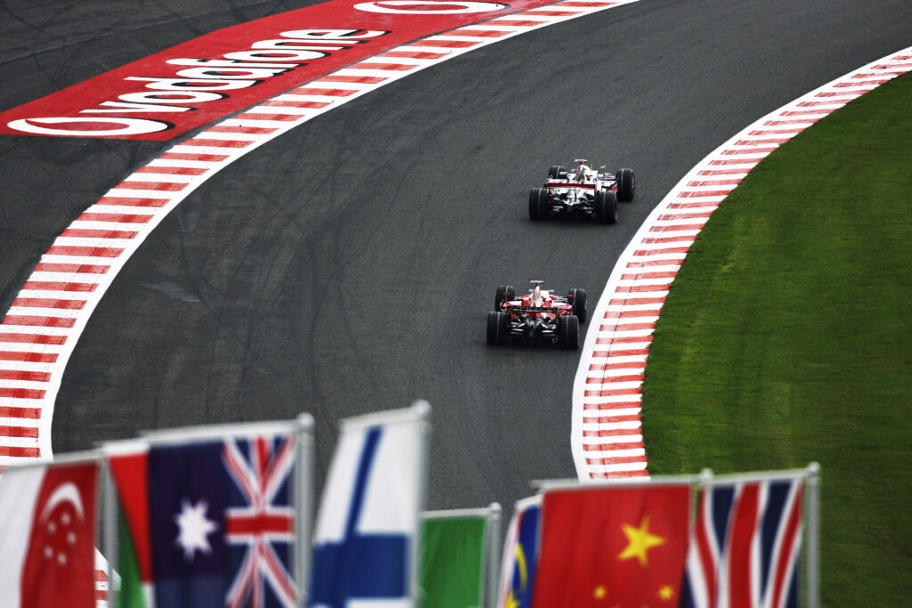 Lewis Hamilton, McLaren, leads Kimi Raikkonen, Ferrari, 2008 Belgian Grand Prix