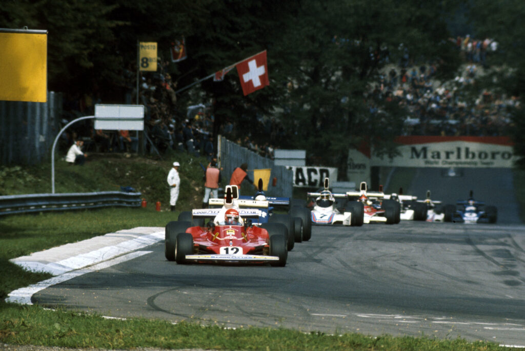 Niki Lauda leads Emerson Fittipaldi at the 1975 Italian GP.